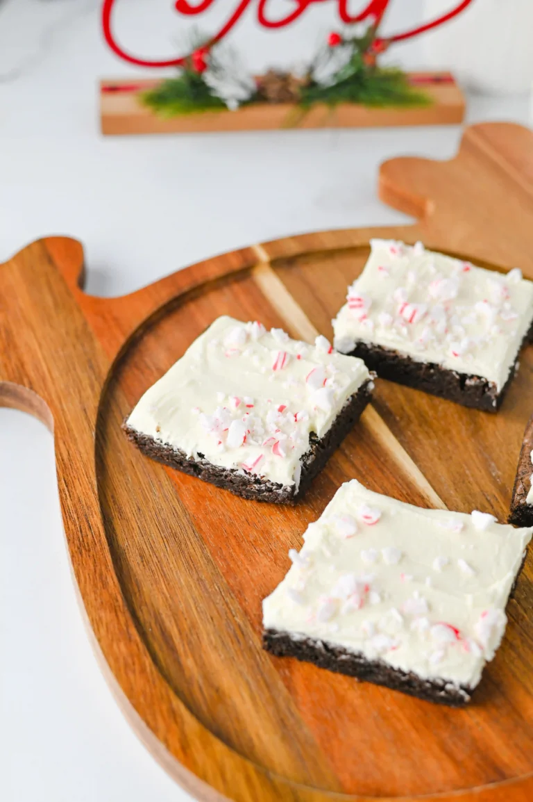 Peppermint brownies with crushed peppermint on a reindeer shaped wooden board