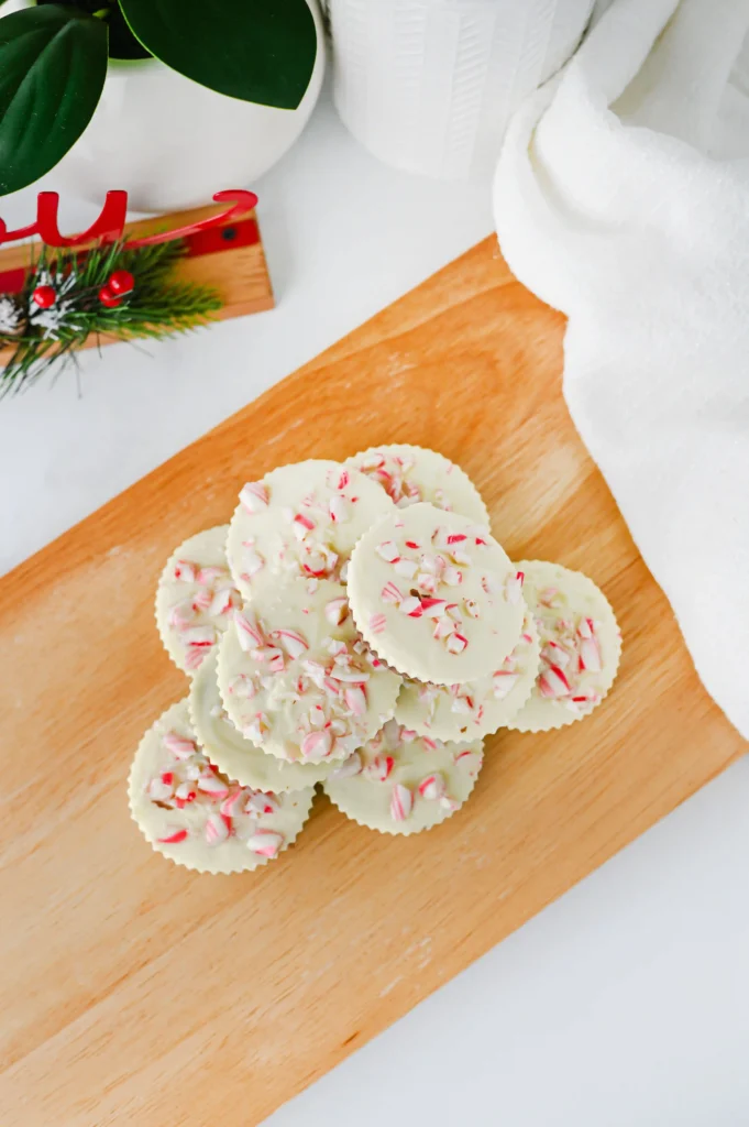 peppermint bark cups with chocolate and crushed peppermint on top