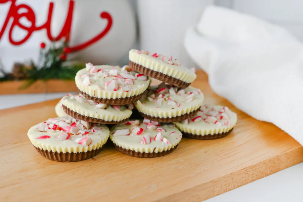peppermint bark cups with chocolate and crushed peppermint on top