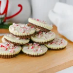 peppermint bark cups with chocolate and crushed peppermint on top