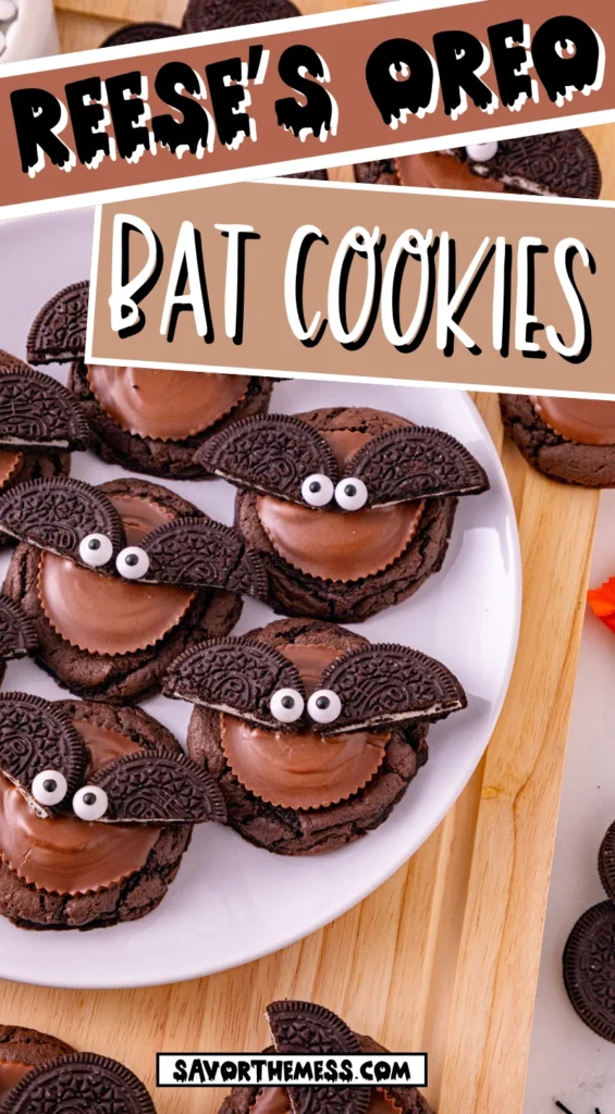 reese's and oreos on top of a chocolate cookie to look like a bat