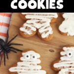 gingerbread cookies with icing on them to look like mummies