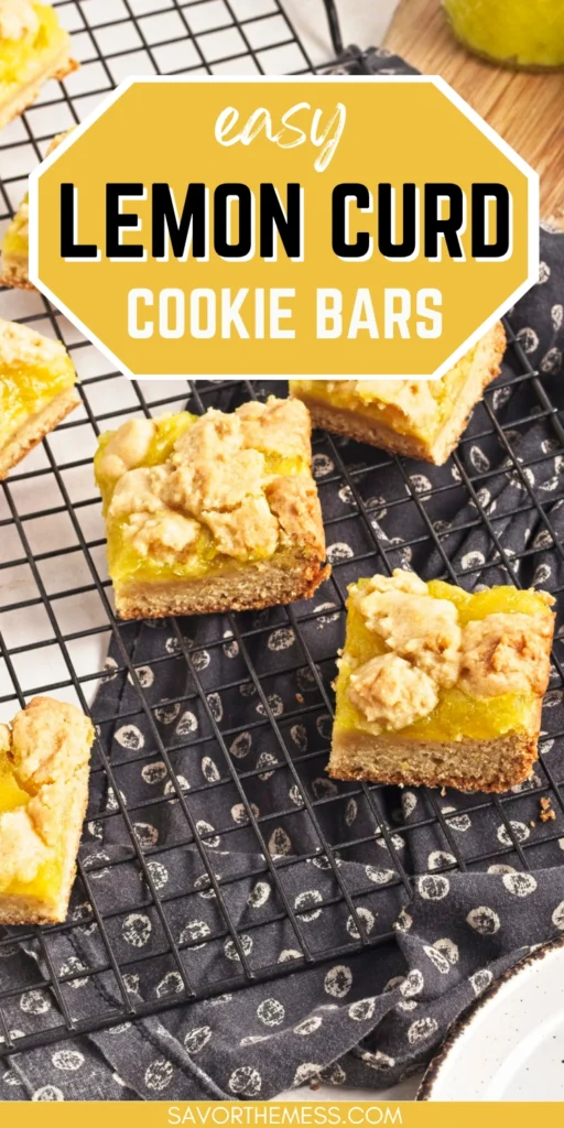 Lemon Curd Cookie Bars on a wooden board next to a jar of lemon curd