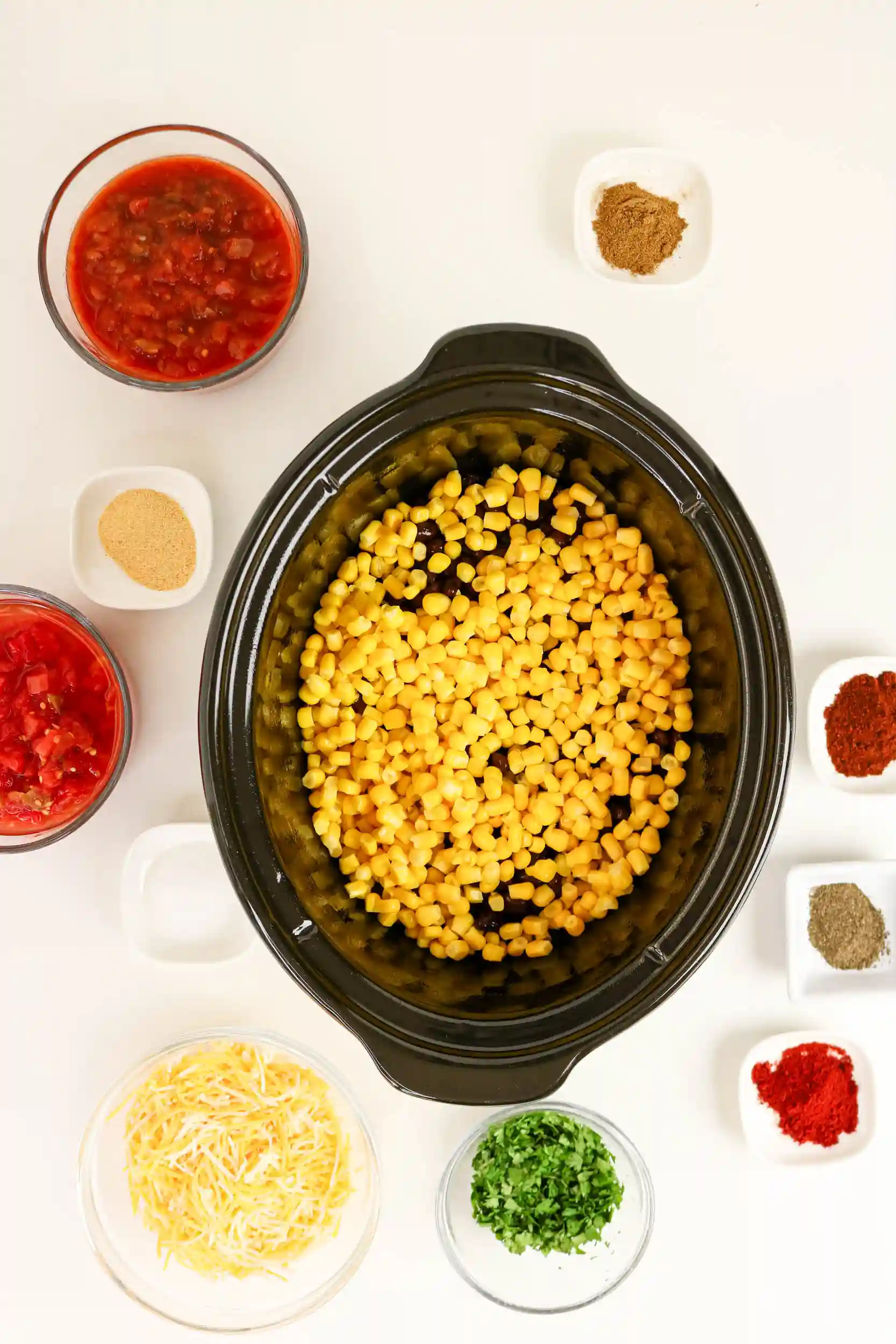 chicken, beans, and corn in a crock pot