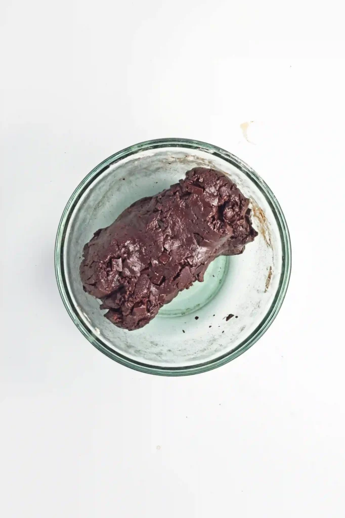 double chocolate cookie batter in a glass bowl