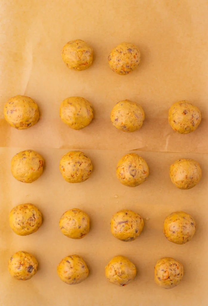 butterfinger balls on parchment paper