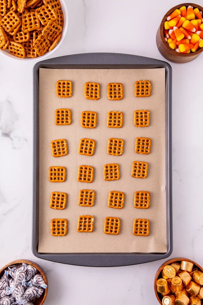 pretzels on a baking sheet with parchment paper and pretzels