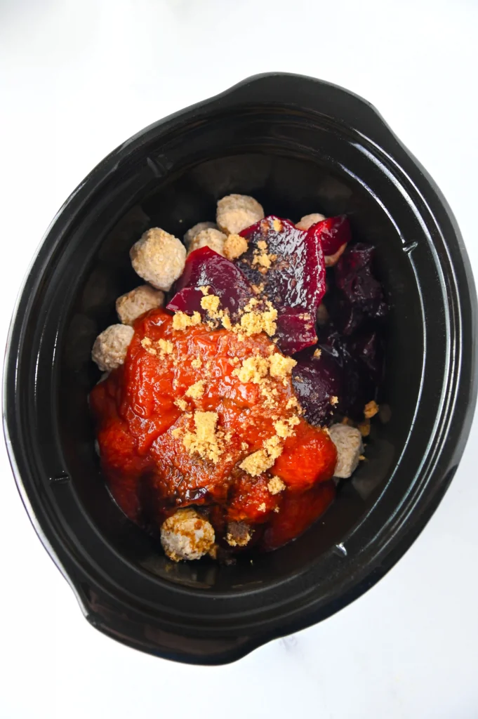 meatballs, chili sauce, cranberry sauce, brown sugar, and Worcestershire sauce in a crock pot