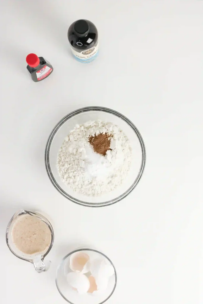 flour, baking powder, salt, and nutmeg in a bowl