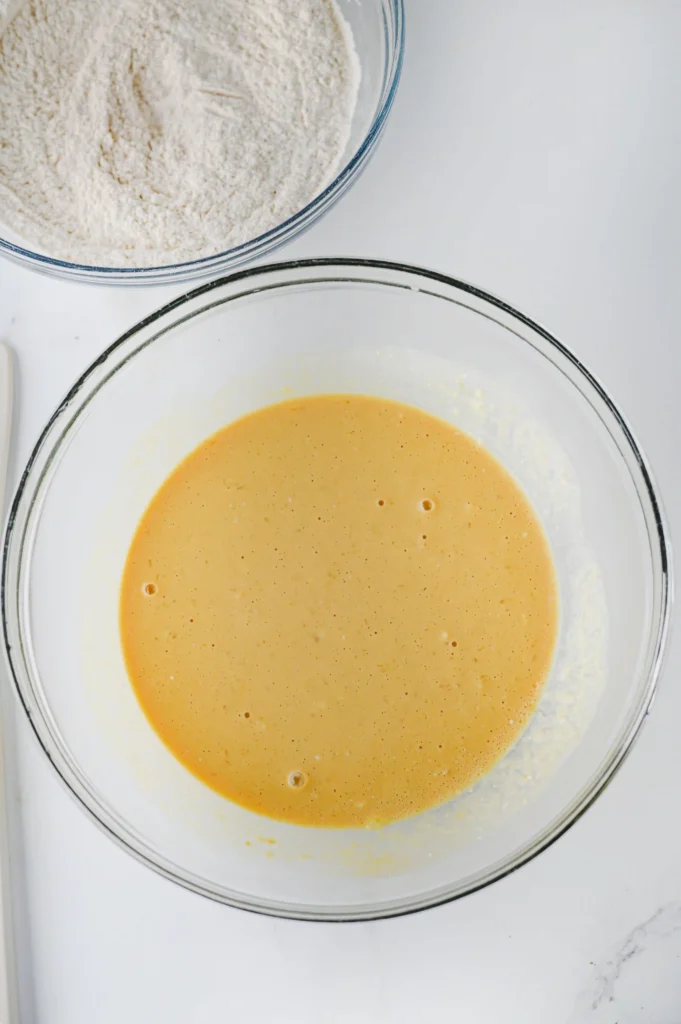 buttermilk, egg, melted butter, and molasses in a glass bowl