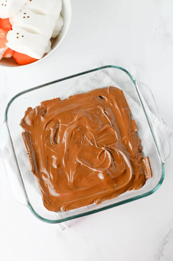melted chocolate in a glass pan 