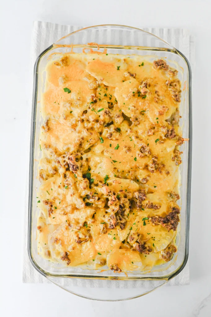 hamburger potato casserole in a glass baking pan