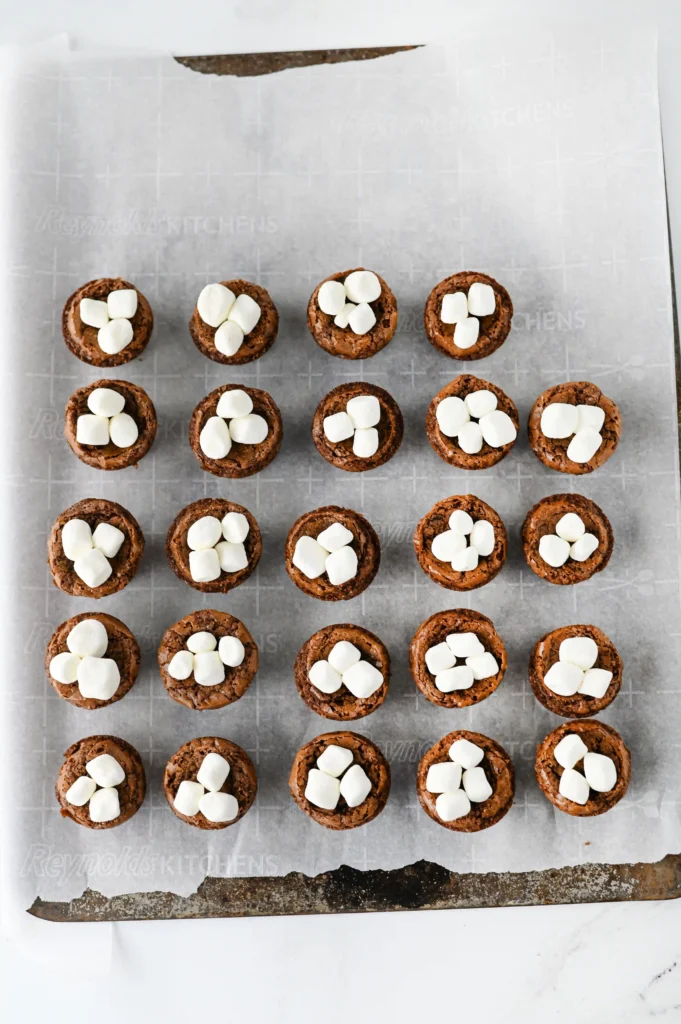 mini brownie bites with mini marshmallows on top