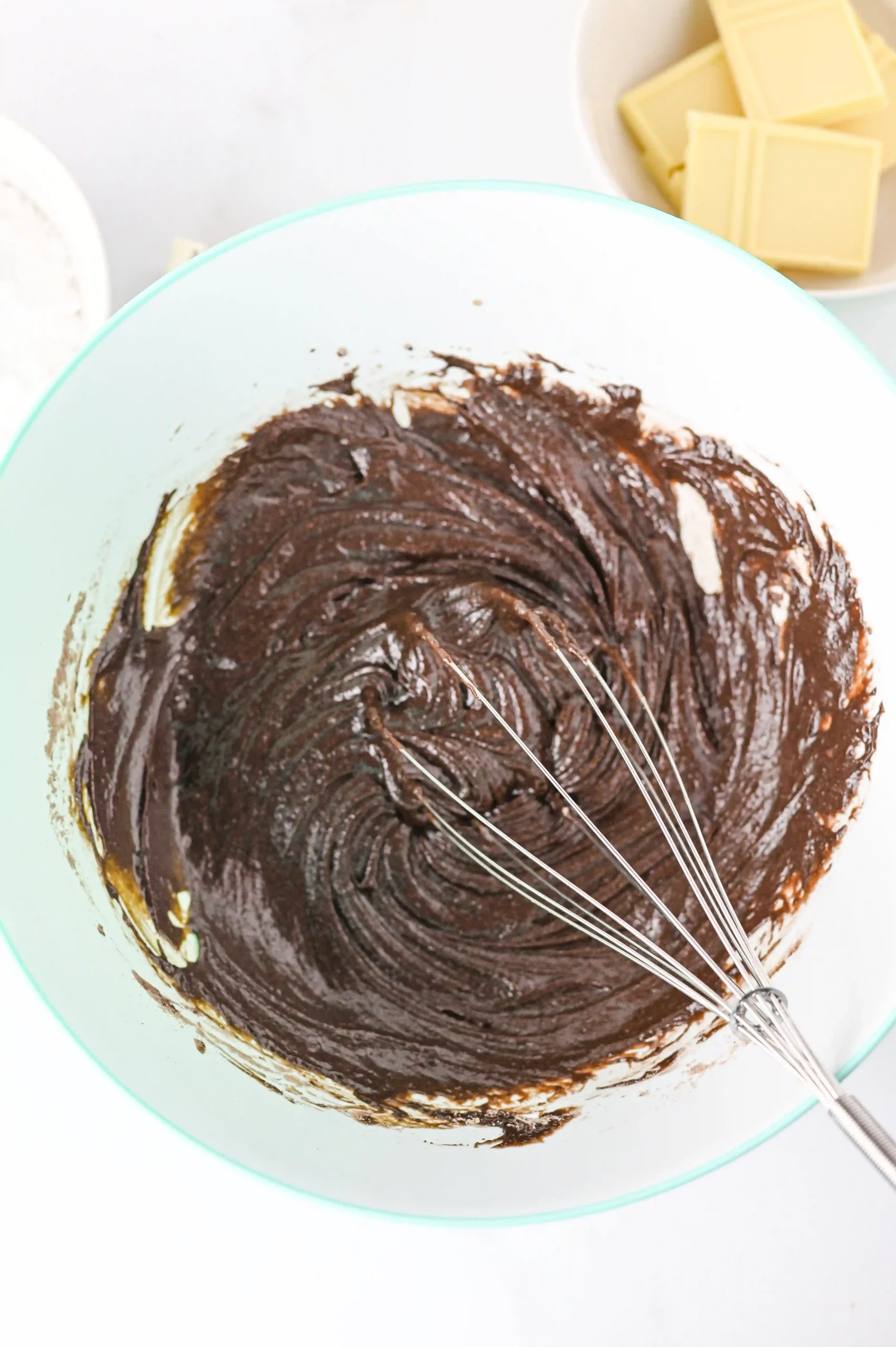 brownie mix in a bowl with a whisk