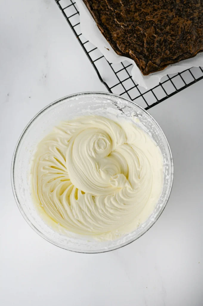 melted white chocolate icing in a bowl